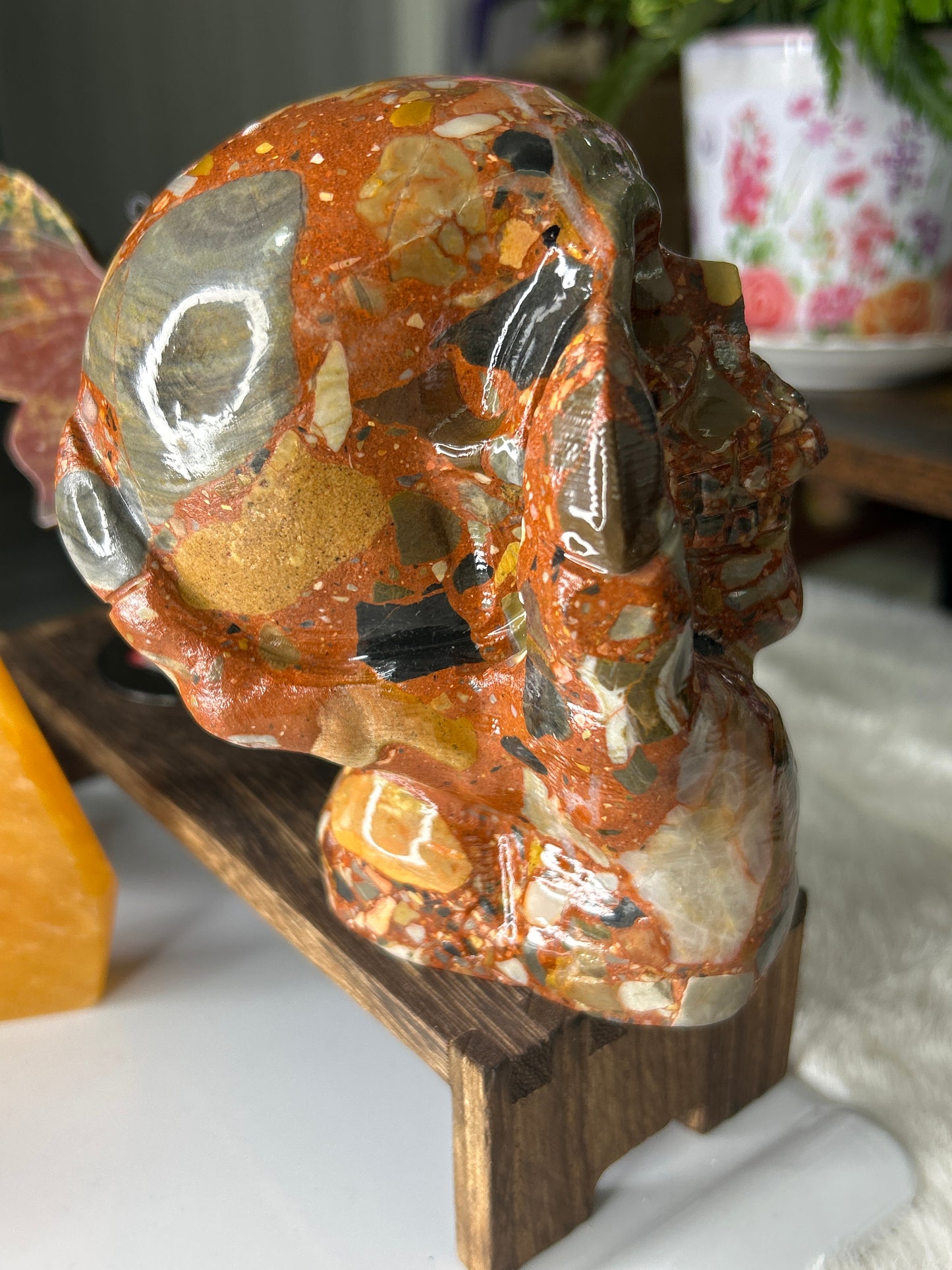 Puddingstone Skull in Hand