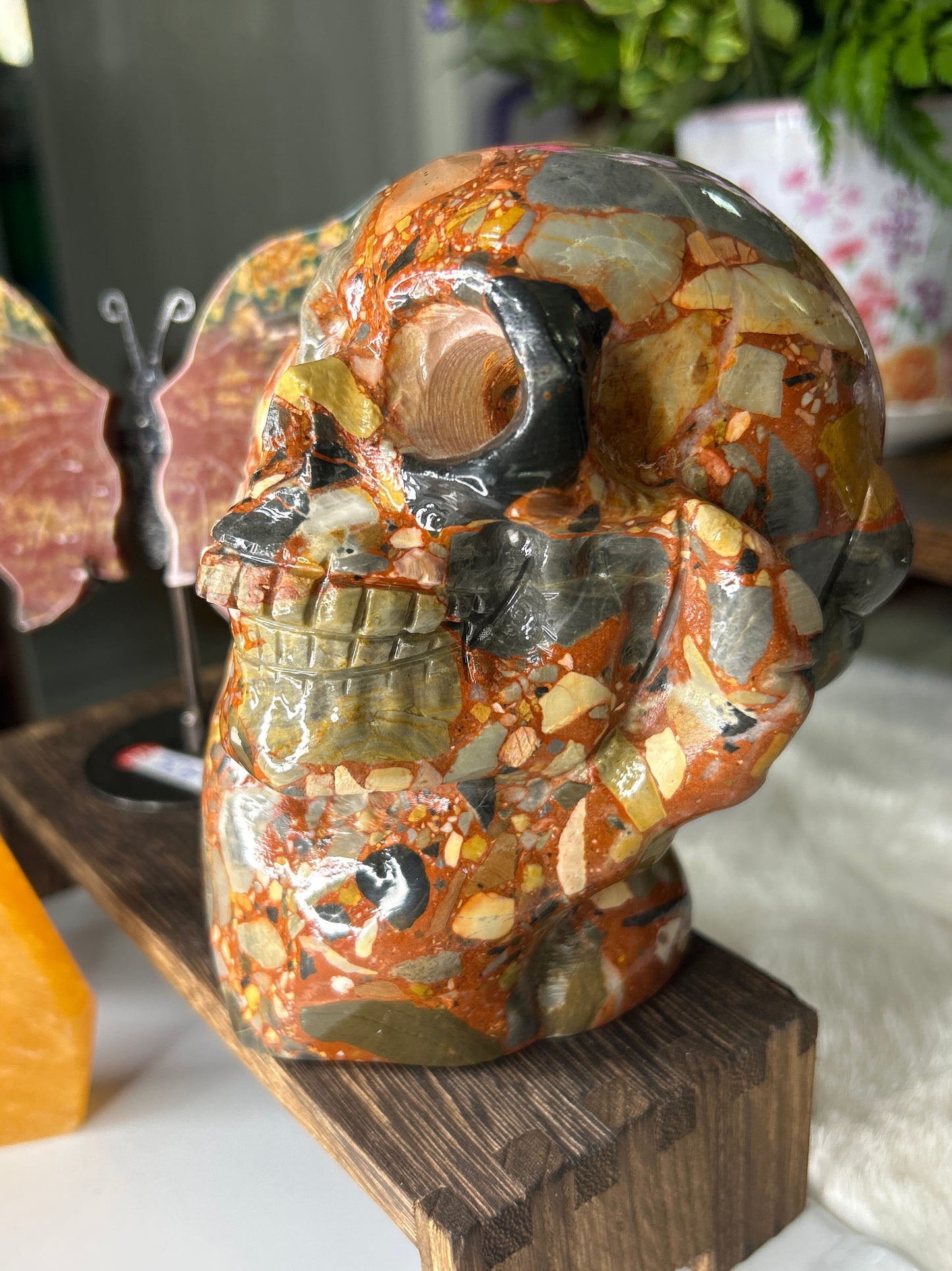 Puddingstone Skull in Hand