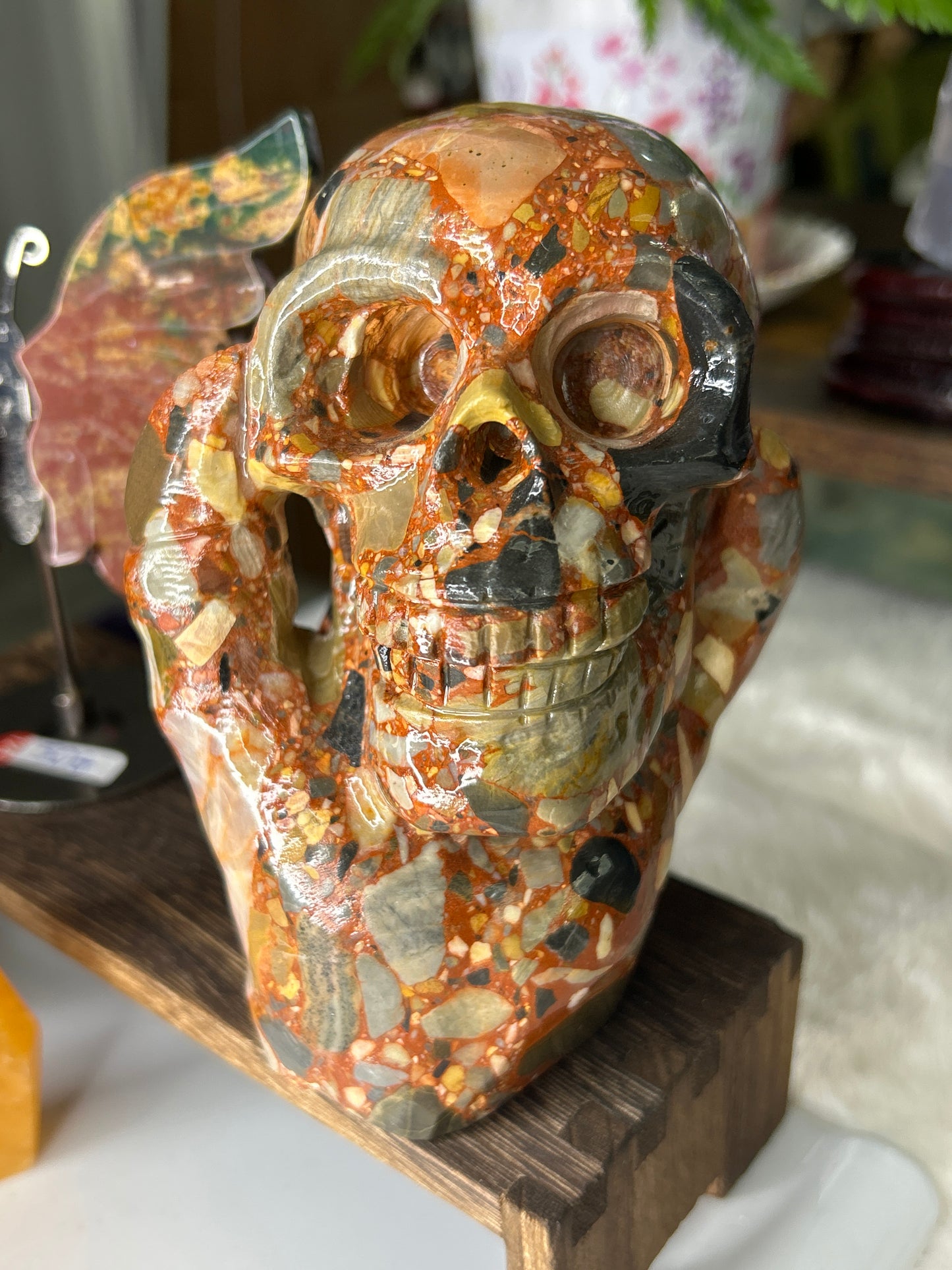 Puddingstone Skull in Hand