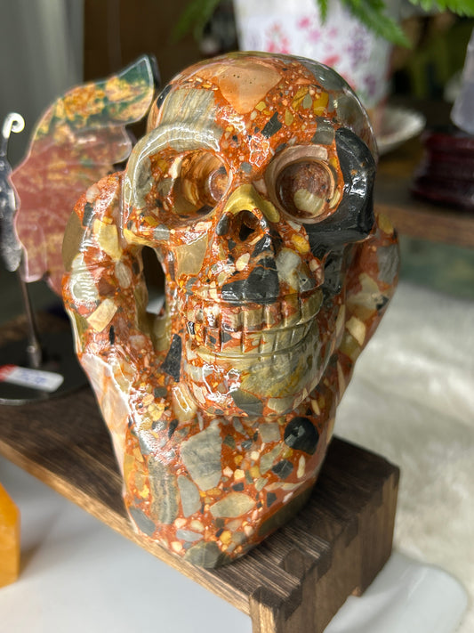 Puddingstone Skull in Hand