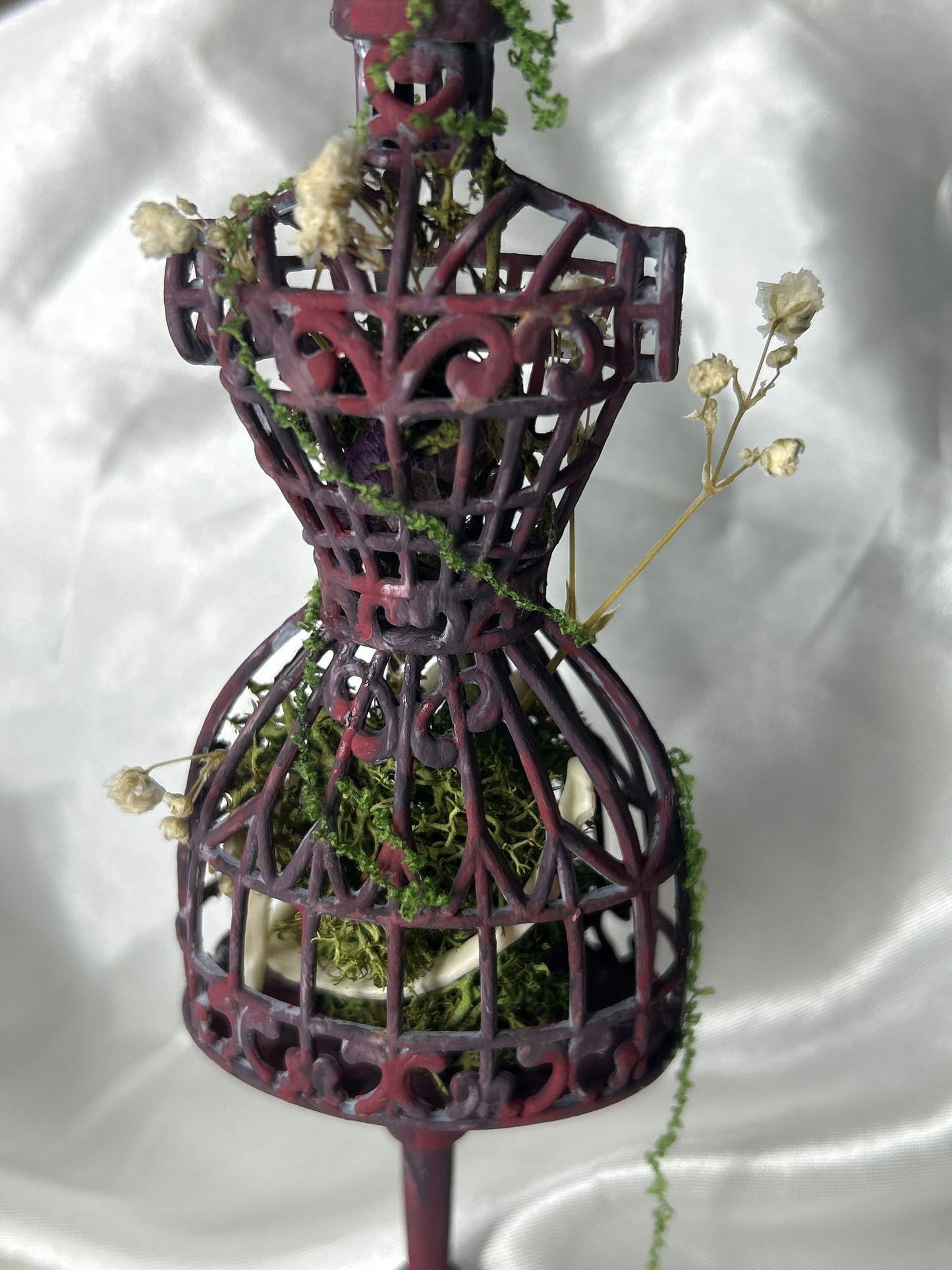 Ornate Dress Form Earring Display Featuring Mink Bones and Botanicals