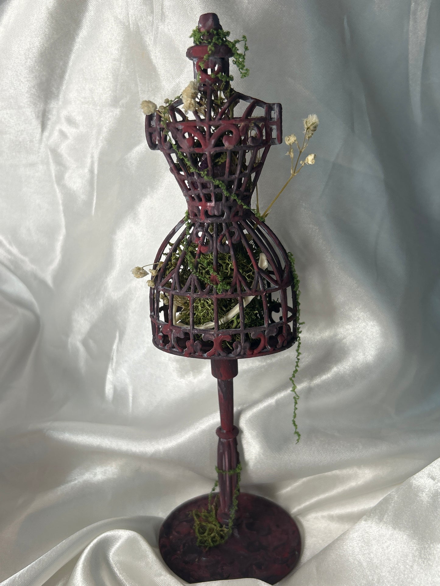 Ornate Dress Form Earring Display Featuring Mink Bones and Botanicals